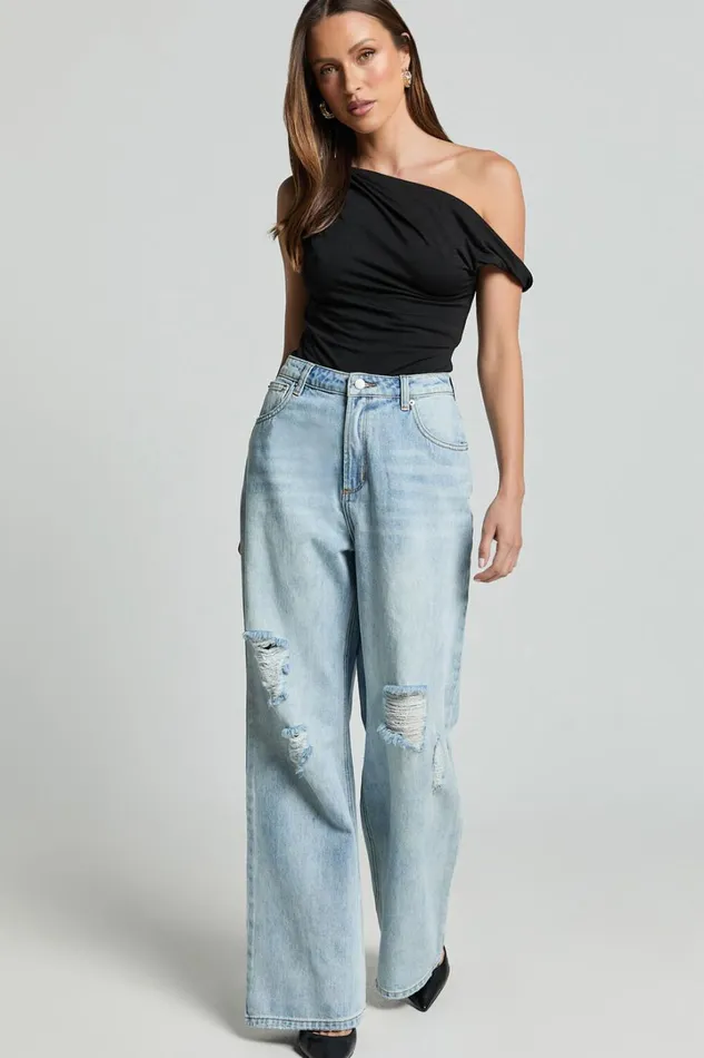 Cate Jeans 8211 High Waist Ripped Wide Leg Recycled Denim Jeans In Light Blue Wash Women Showpo Conscious