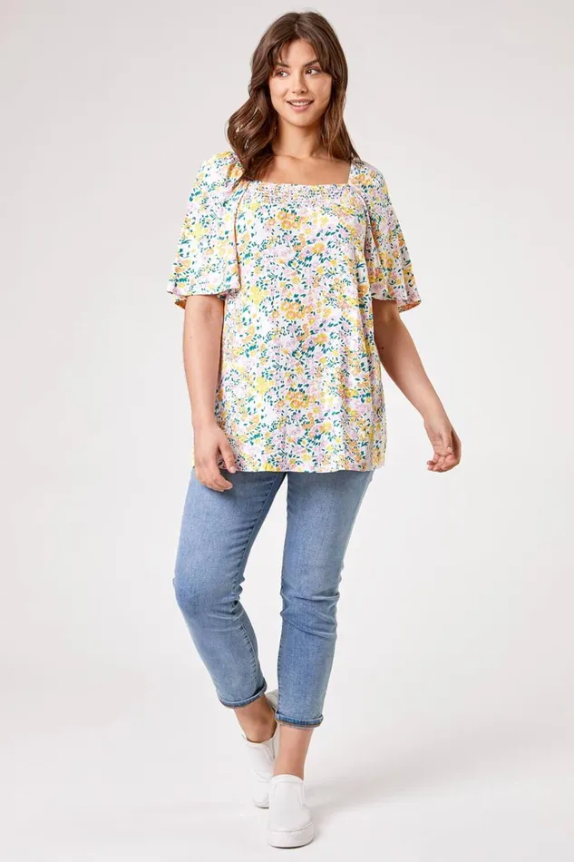 Women Ivory Curve Ditsy Floral Print Longline Top Roman Tops