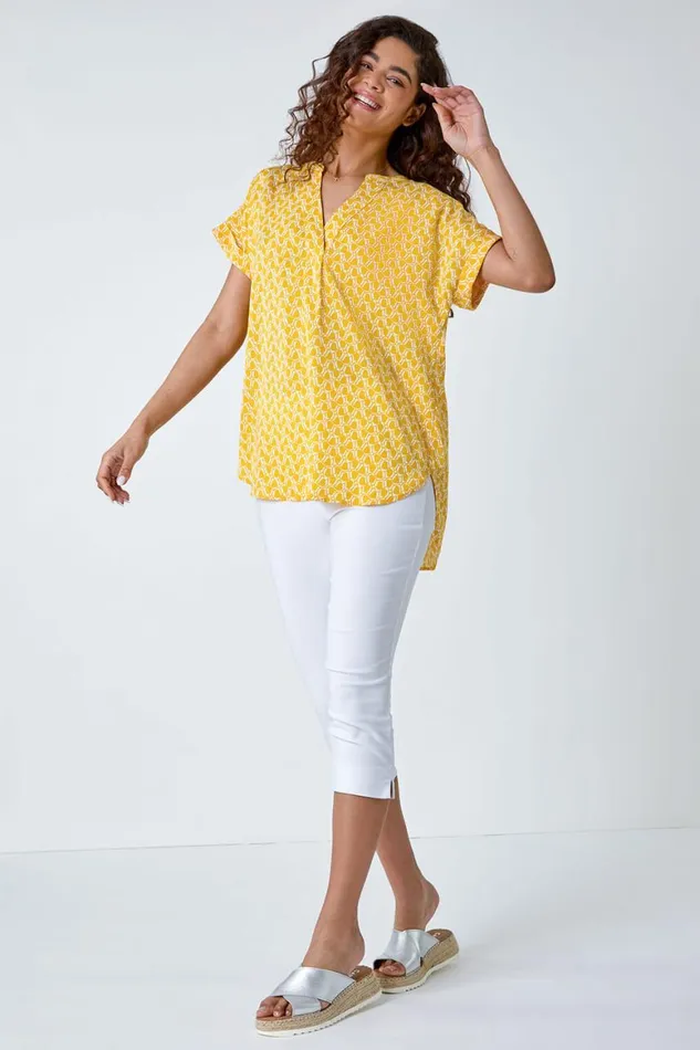 Women Yellow Abstract Print Woven Pleat Front VNeck Top Roman Tops