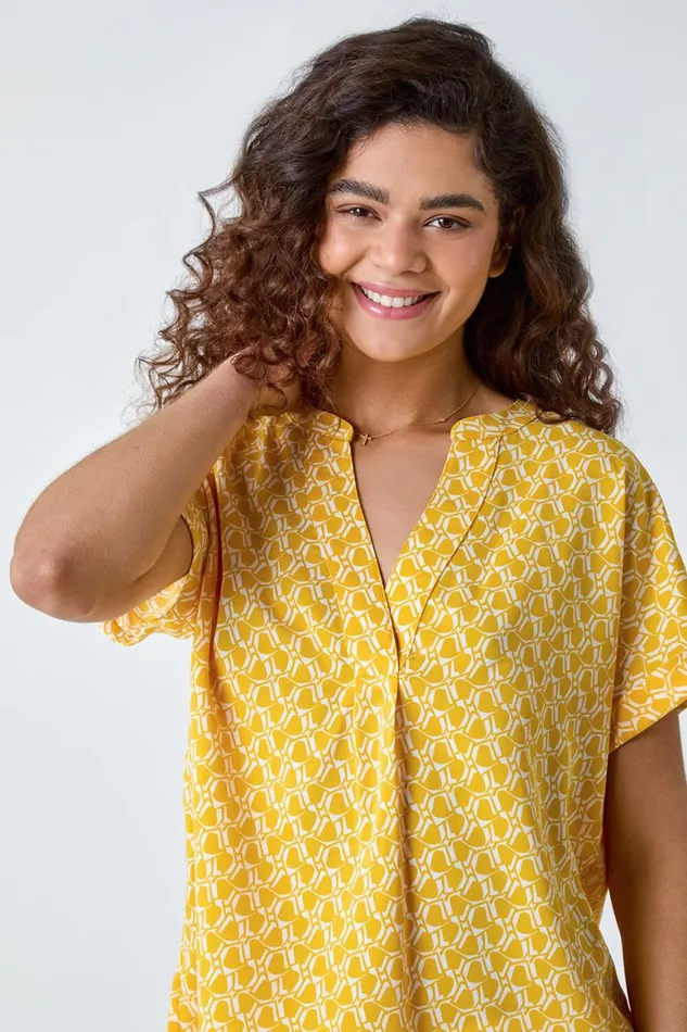 Women Yellow Abstract Print Woven Pleat Front VNeck Top Roman Tops